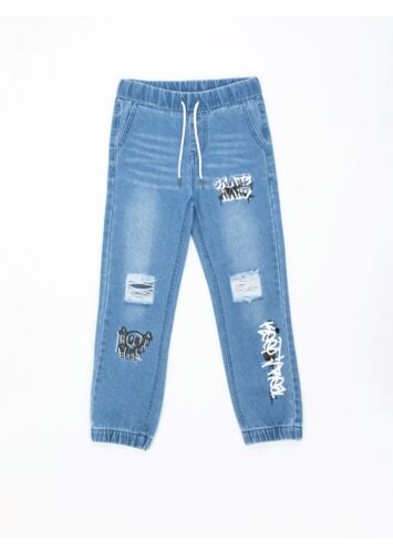 מכנס ג'ינס ג'גר ארוך עם קרעים ודפוס